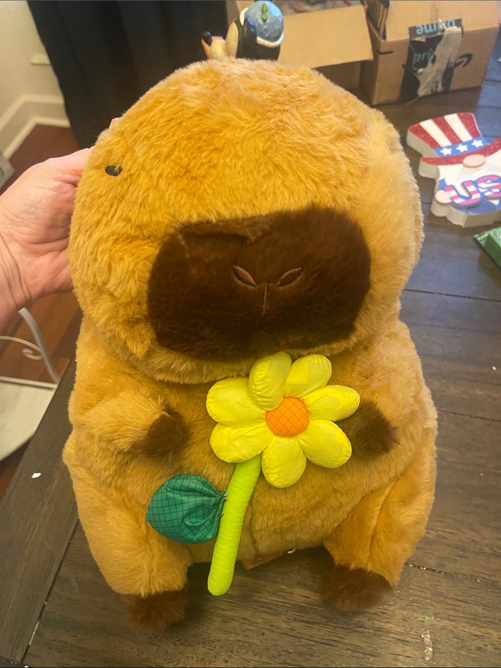 Capabara backpack Plush Brown Bear Holding Yellow Flower Plush Toy
